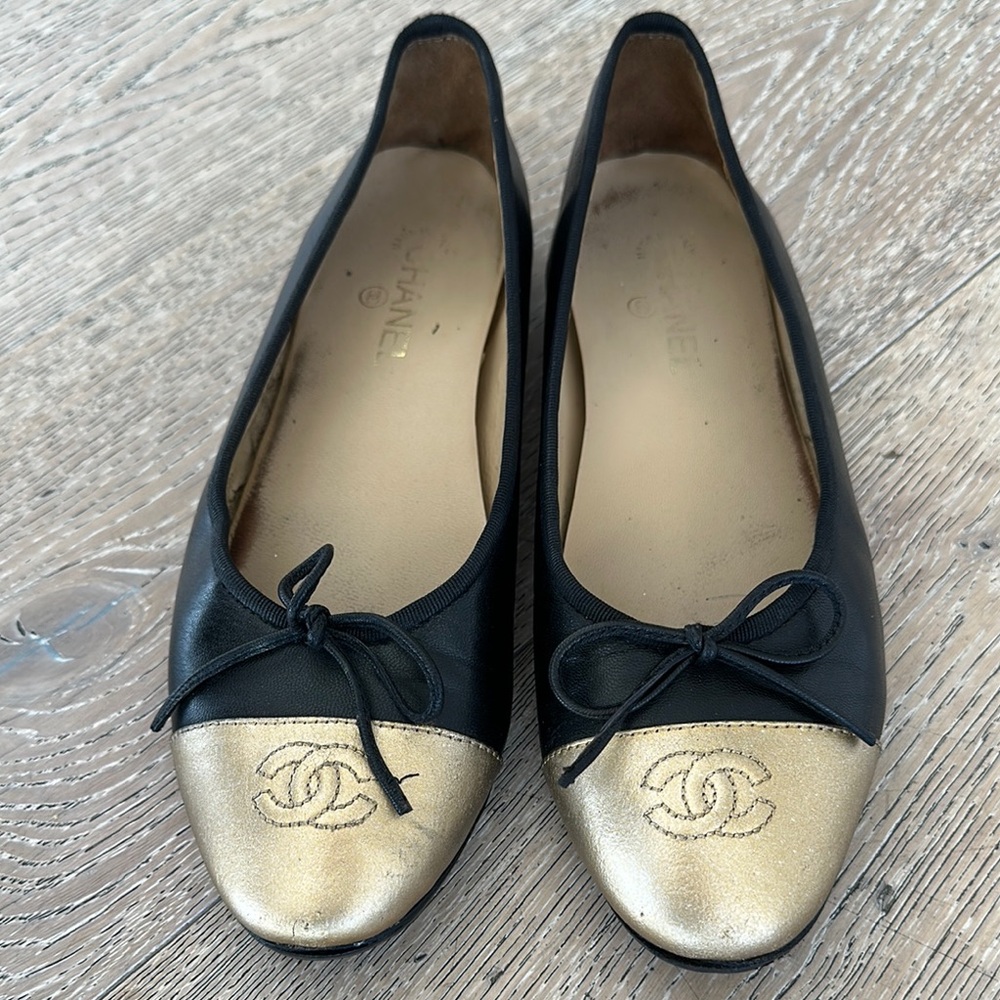 Authentic Chanel, ballet flats, black, and gold recently refreshed!